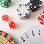 Background with casino game objects isolated on white table